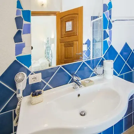 & מלון אולביה